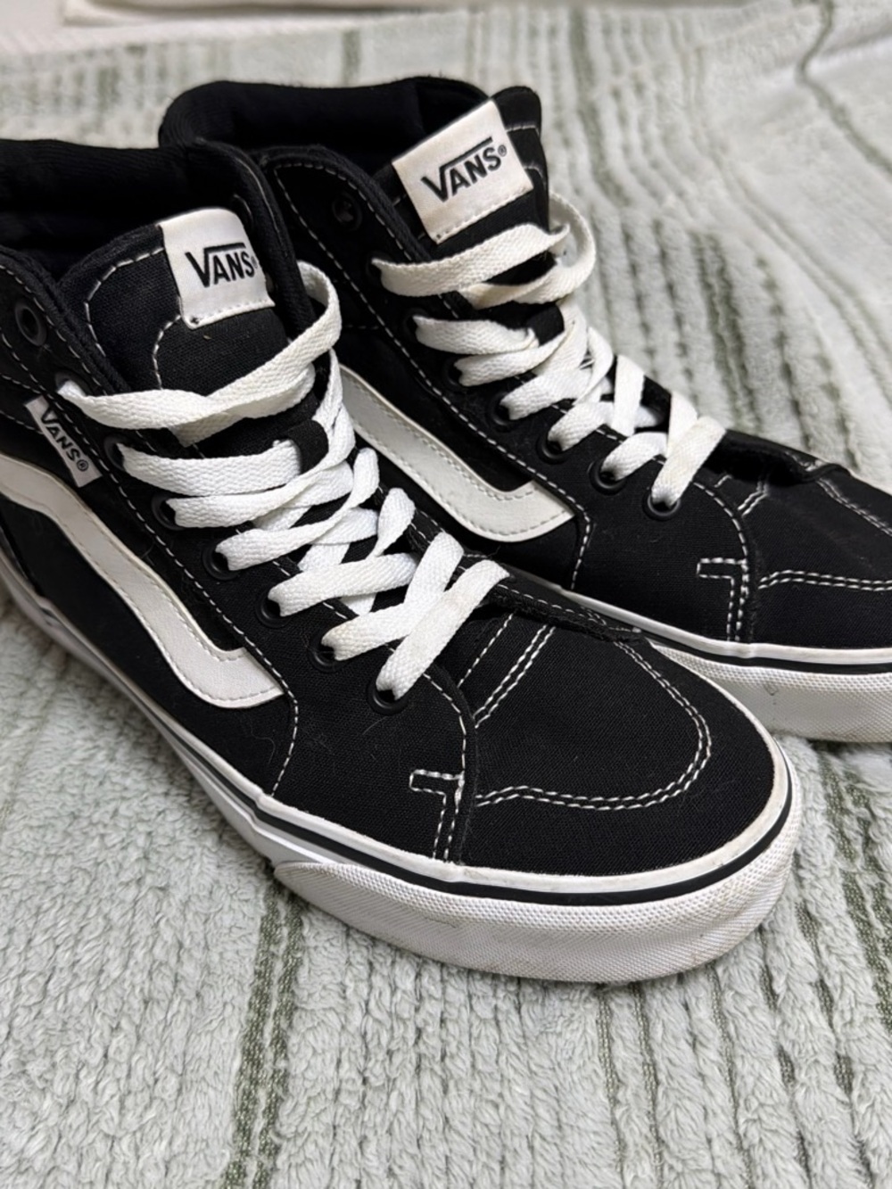 Vans Black and White High-Top Skate Sneakers